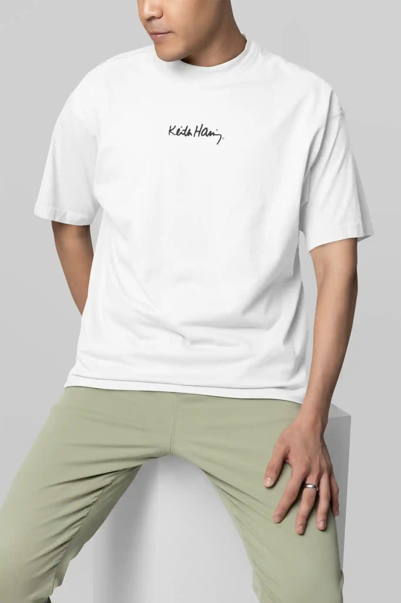 mockup-featuring-a-man-wearing-an-oversized-round-neck-tee-in-a-studio-m38923_ultra_light Keith Haring 1958 – Image 1